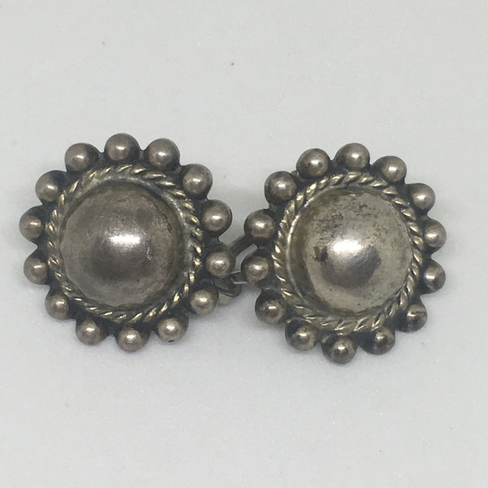Very old silver twist back circle design earrings